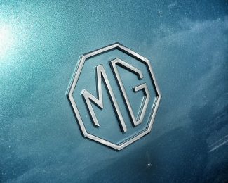 MG
